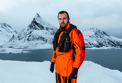 Hansen Protection Man Wearing Suit Lifjacket In Arctic