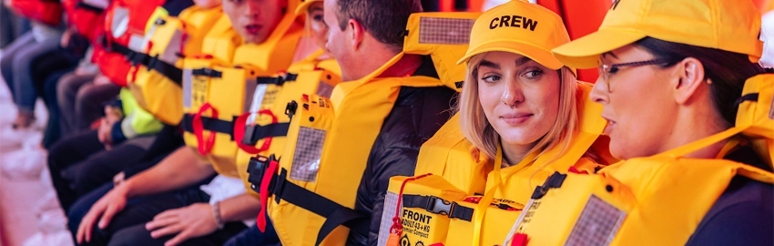 Survitec Company Overview People Wearing Premier Lifejackets